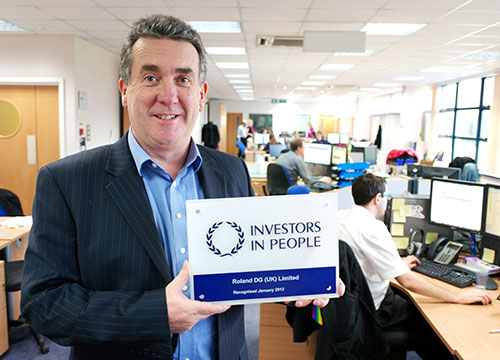 Jerry Davies, Managing Director, Roland DG (UK) with IIP Award